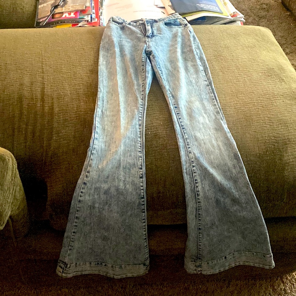 I’m selling these bell bottoms that I don’t fit anymore due to growth.